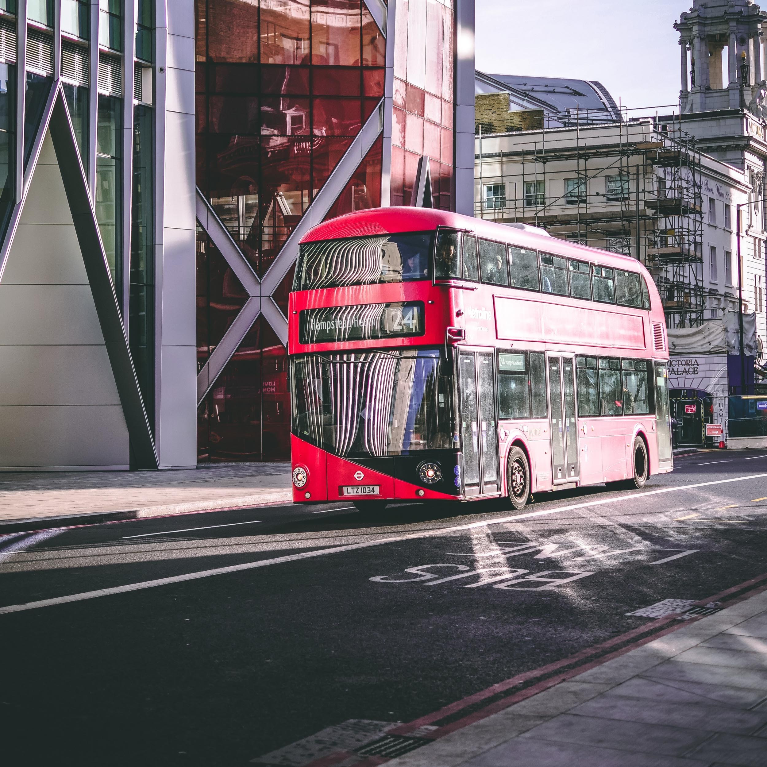 double-decker bus driving on a street