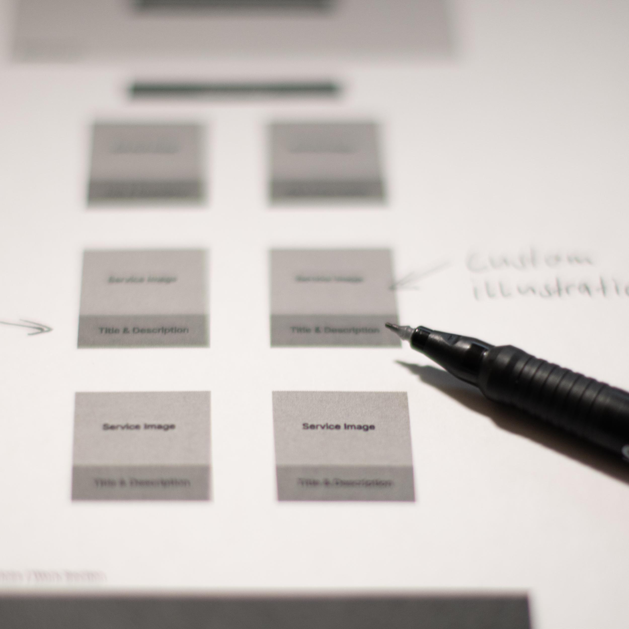 wireframe website layout with pencil on top